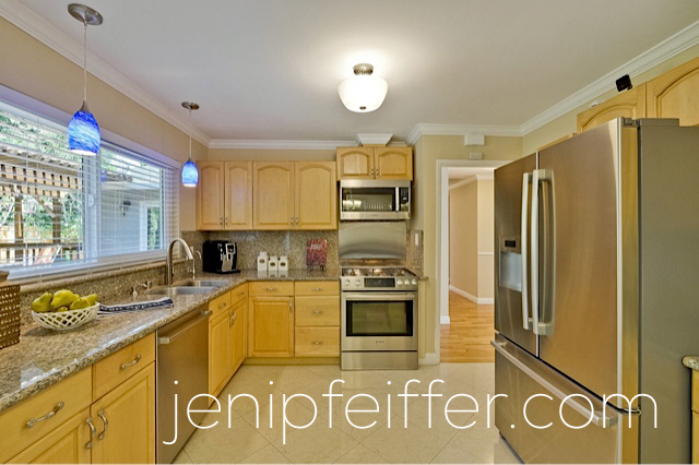 Beautiful Granite Counters, Maple Cabinetry and Stainless Steel Applicances. Photo Courtesy Jeni Pfeiffer